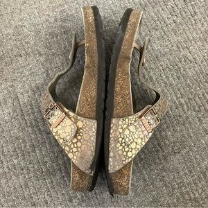 Birkenstock pink gold patterned flip flops sandals.  Adjustable straps.